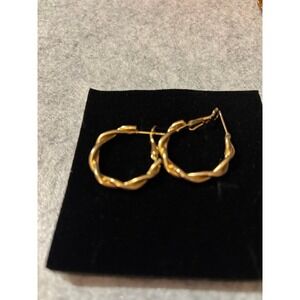 Twisted Gold-tone earrings‎